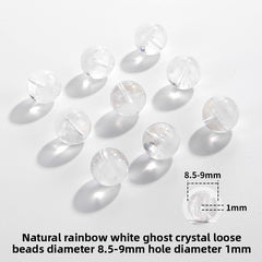 Clear quartz crystal rounds with white phantom inclusions and faint rainbow flash — Frostbow Atrium (7–14 mm).