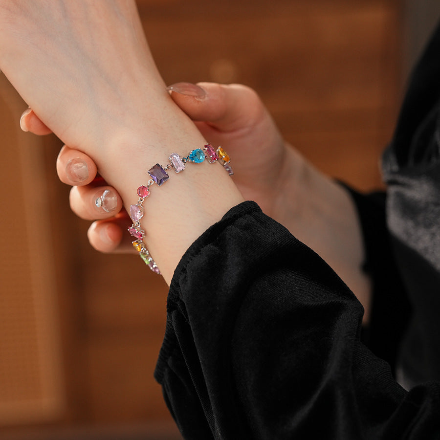 Iridescent Charm Bracelet in vivid multicolor zircon stones on silver-tone copper chain, elegant and lightweight luxury jewelry.