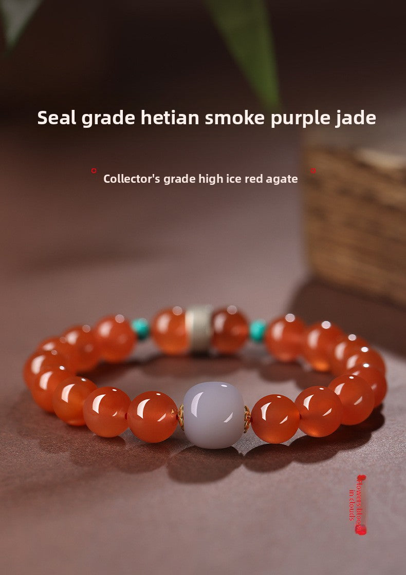 Collectible-grade Hetian jade bracelet with high-ice red agate centerpiece and turquoise accents — Crimson Serenity Hetian Jade Bracelet.