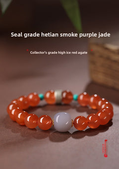 Collectible-grade Hetian jade bracelet with high-ice red agate centerpiece and turquoise accents — Crimson Serenity Hetian Jade Bracelet.