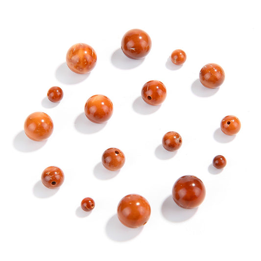 Natural Cook wood beads, amber-tone grain, polished, assorted 4–10 mm — Ambergrain Warmth.