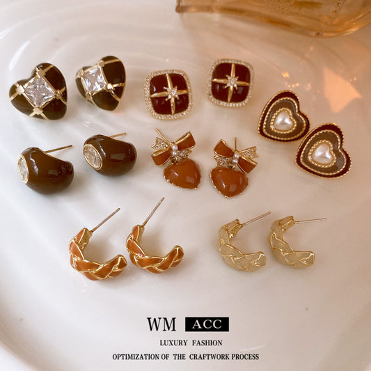 Stud earrings collection with enamel/stone cabochons, crystal accents and gold-tone settings — 43 variants — Eternal Heart Gem Earrings Collection.
