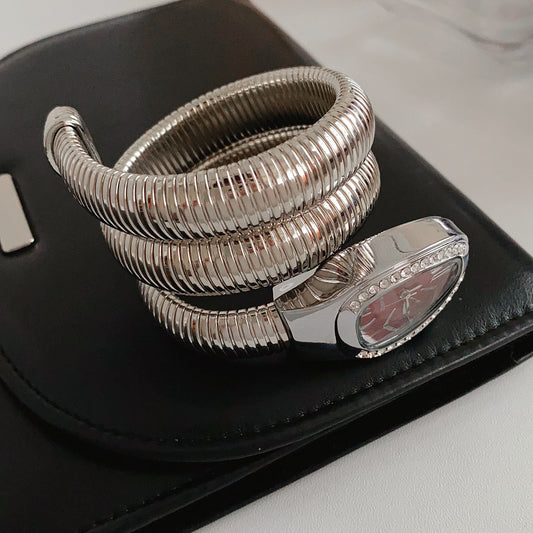 Silver tubular coil wrap cuff bracelet with pavé teardrop end cap — Serpentine Coil Wrap Cuff by Glazenya.
