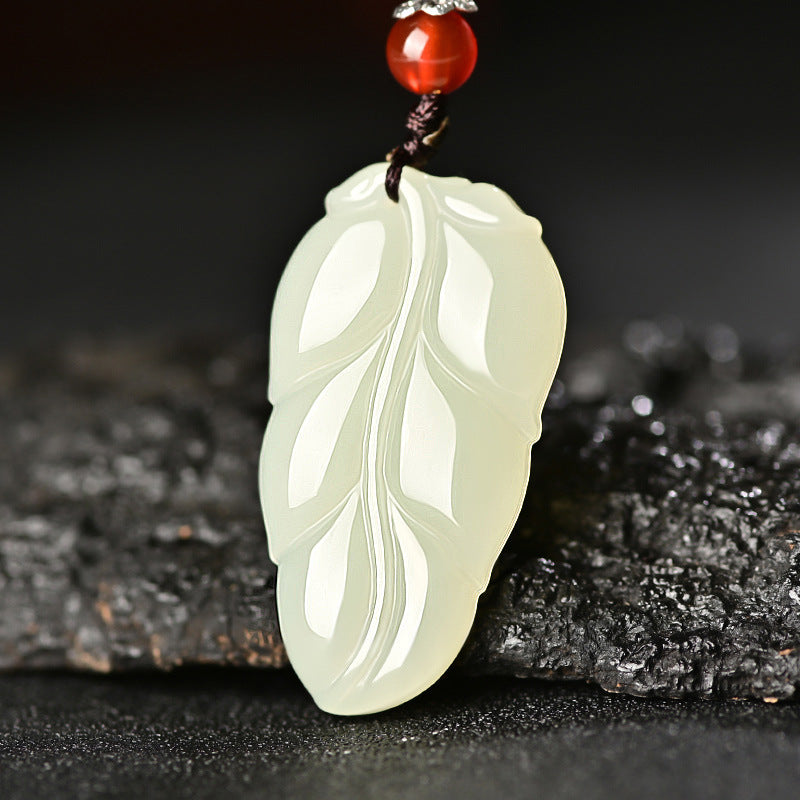 Hetian (nephrite) white jade leaf pendant close-up – Golden Bough, 38×21×8 mm