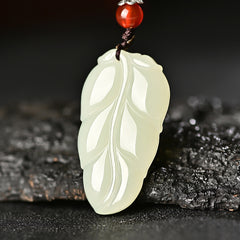 Hetian (nephrite) white jade leaf pendant close-up – Golden Bough, 38×21×8 mm