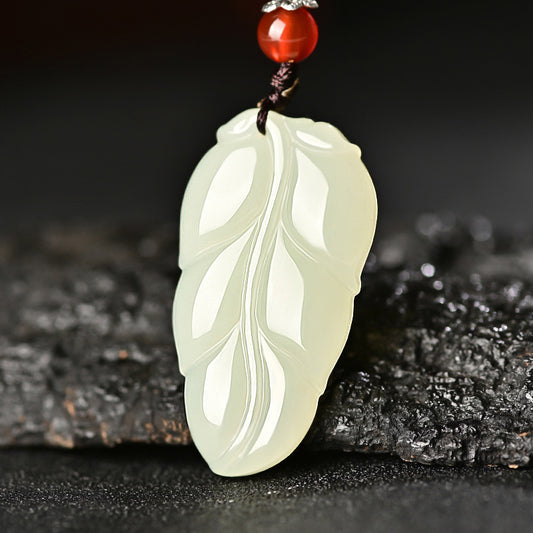 Hetian (nephrite) white jade leaf pendant close-up – Golden Bough, 38×21×8 mm