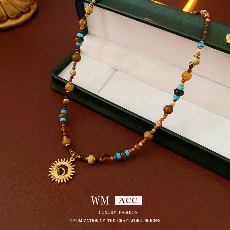 Sun pendant beaded necklace collection — multiple styles displayed