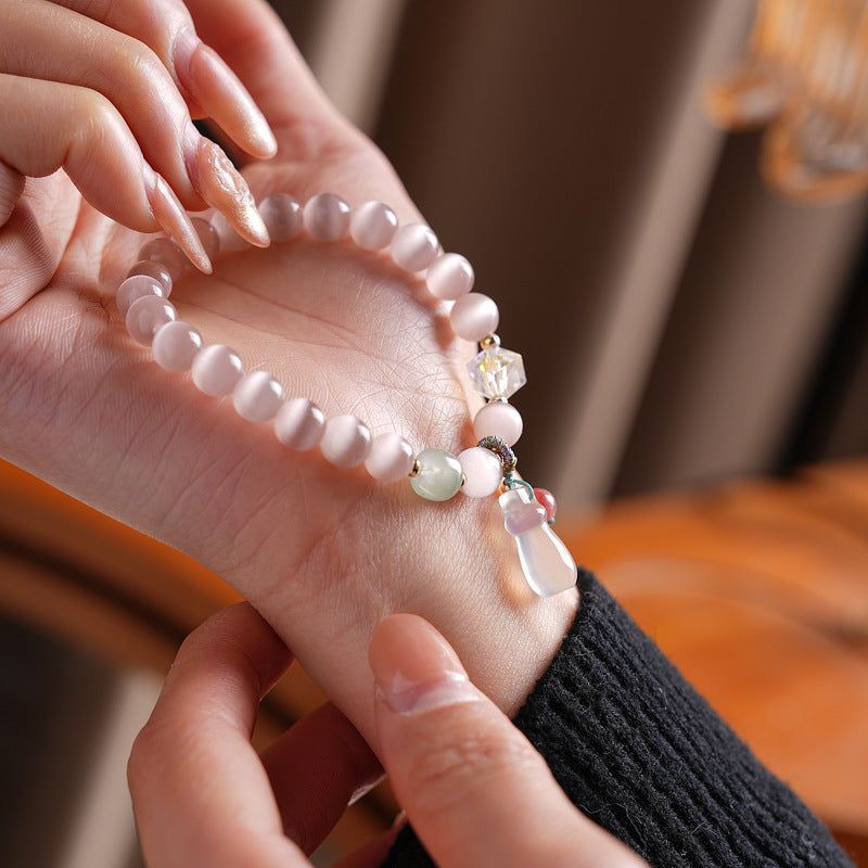 Pastel cat’s-eye and chalcedony beaded bracelet with frosted cat pendant — Moonlit Cat’s Eye Charm Bracelet by Glazenya.