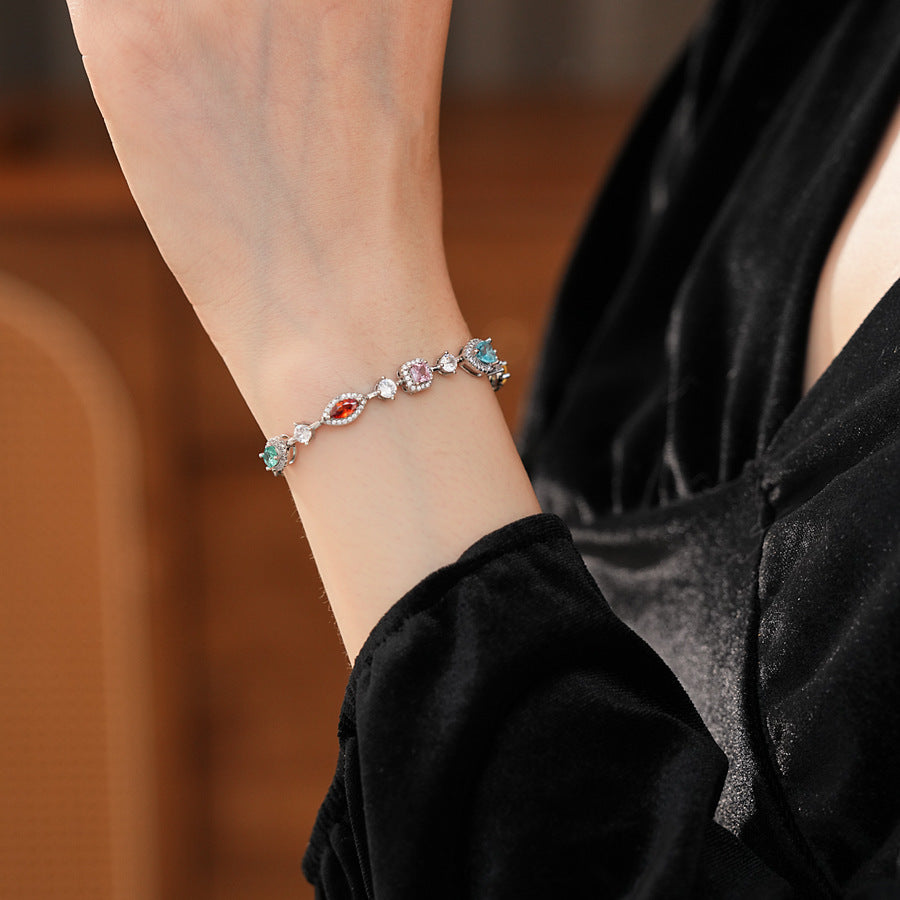 Iridescent Charm Bracelet in vivid multicolor zircon stones on silver-tone copper chain, elegant and lightweight luxury jewelry.