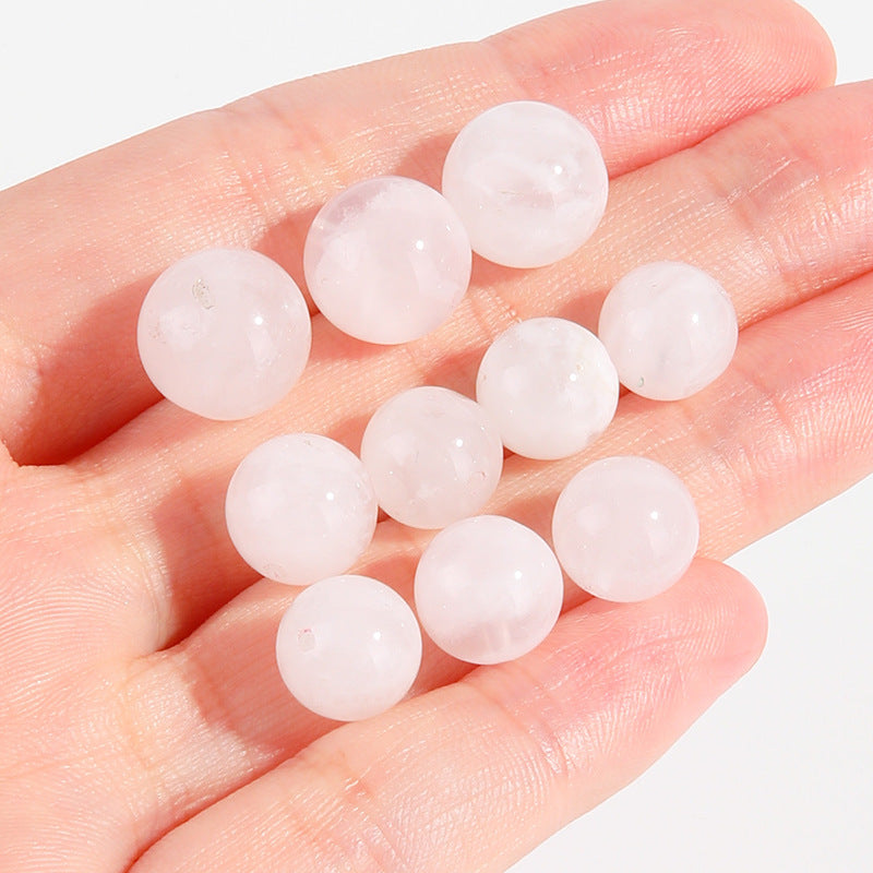 Snow Phantom Quartz round beads with frosty, snowflake-like inclusions—Frost-Mist Bloom (10/12 mm).