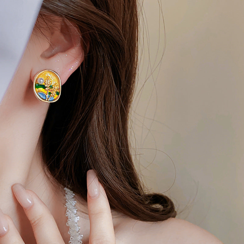 Oval enamel stud earrings in sunlit meadow colors with a pearl accent and gold rim — Sunlit Meadow Pearl Enamel Studs.
