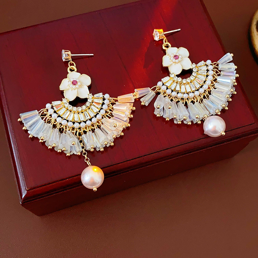 Floral fan chandelier earrings with layered crystal fringe and pearl drops — Blossom Fan Pearl Fringe Earrings.